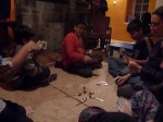Students playing "spoons" at a class night dinner at my house.